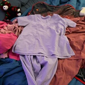 6 sets of xl women's scrubs, added more